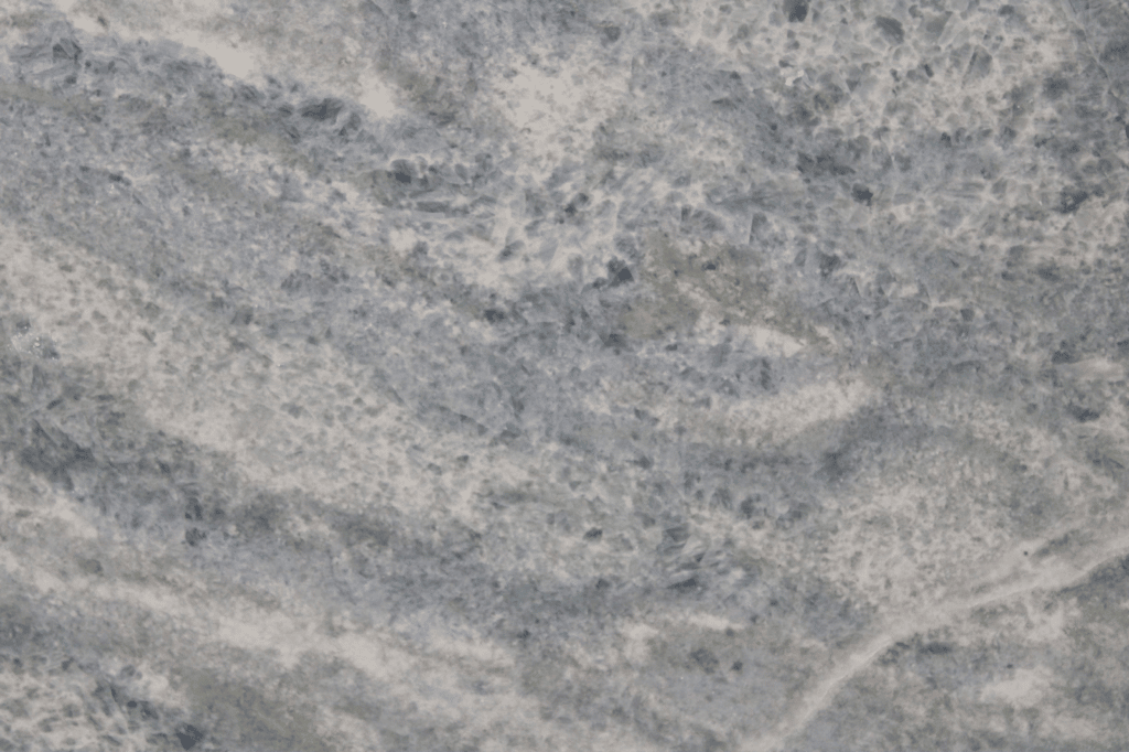 Seamless white quartz texture pattern. The subtle texture is tileable, best  for repeating countertop background surface. Quartz is an engineered stone  kitchen counter material unlike marble / granite. Stock Photo