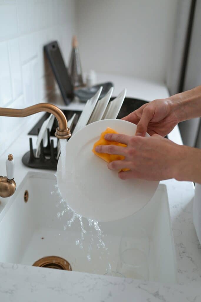 Small kitchen ideas: tension rod above sink - Engineer Your Space